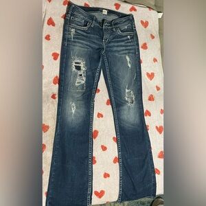 Distressed Blue Jeans